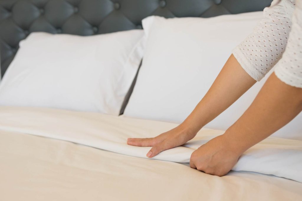 Fixing Sheets on Bed